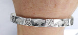 Silver Plated Flower & Bird Design Bangle Bracelet at Rubini Jewelers