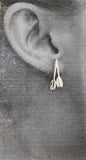Overlapping Half-Oars Post Earrings, tulips shown on ear, by Rubini Jewelers