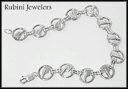 Link: Loops with mini rowing blades bracelet by Rubini Jewelers