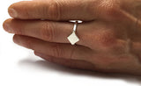 Silver Diamond Shaped Signet Ring by Rubini Jewelers, shown on a hand