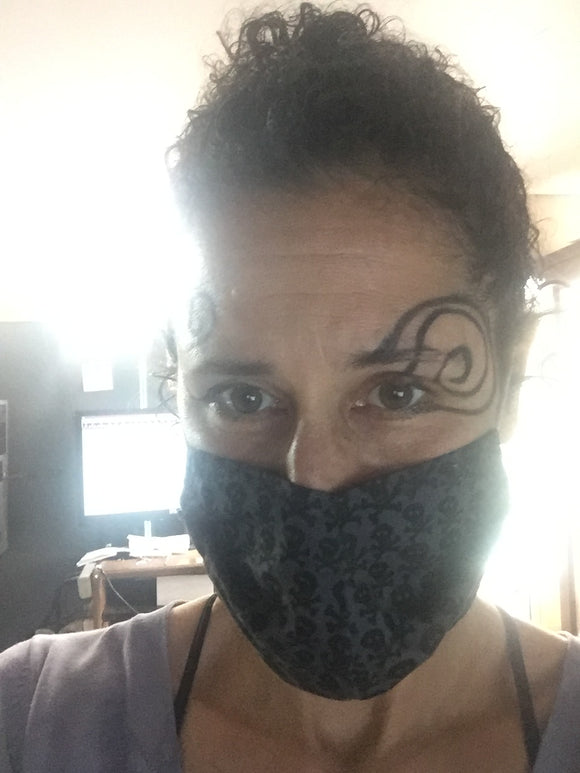 Joanna Rubini wearing COVID 19 pandemic required mask at Rubini Jewelers
