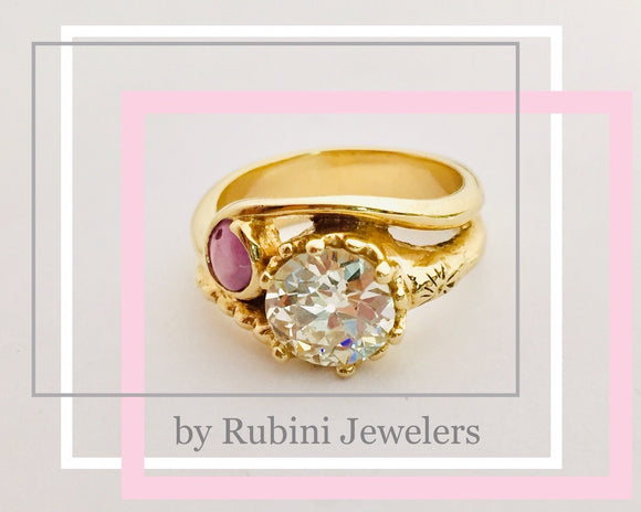 European cut diamond and star ruby yellow gold magical two stone engagement ring by Rubini Jewelers