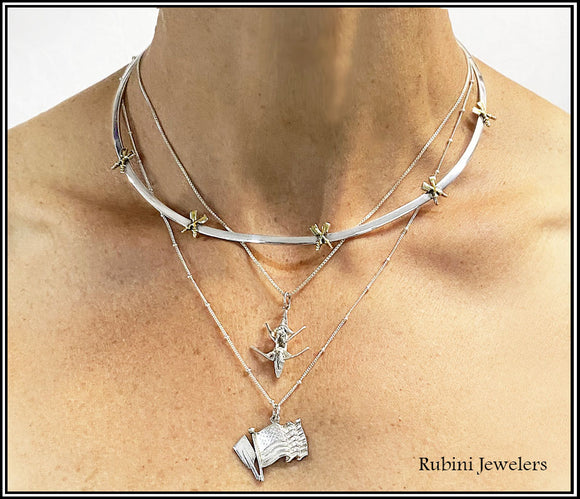 Rowing Necklaces and Pendants by Rubini Jewelers