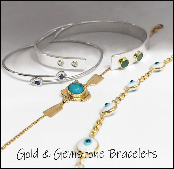 Gold and Gemstone Bracelets available from Rubini Jewelers: White gold diamond sapphire bracelet,  sterling silver and gold diamond and emerald bracelet by Rubini Jewelers, 14kt gold and turquoise rowing bracelet, 14kt yellow gold evil eye link bracelet