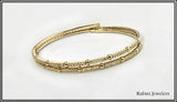 14Kt Yellow Gold Double Flexible Bangle Bracelet with Diamonds at Rubini Jewelers