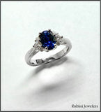 14Kt White Gold Oval Sapphire and Diamonds Engagement Ring at Rubini Jewelers.