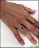 14Kt White Gold Oval Sapphire and Diamonds Engagement Ring at Rubini Jewelers.