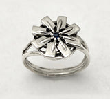 Flower of Eight Rowing Hatchet Blades with a Sapphire Ring by Rubini Jewelers