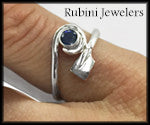 Sapphire in a Spiral with Hatchet Blade Rowing Ring by Rubini Jewelers