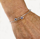 14Kt White Gold Diamond Halo Two Sapphire Dainty Bypass Bracelet, available at Rubini Jewelers