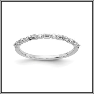 14Kt White Gold Baguette and Round Diamond Band at Rubini Jewelers