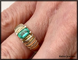 Ring: 14kt gold & sterling silver .53ct emerald at Rubini Jewelers