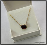 14Kt Gold Twist Link Chain with Garnet Necklace at Rubini Jewelers