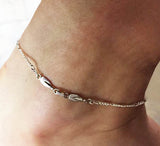 Two Petite Rowing Tulip Blades with Figaro Chain Anklet by Rubini Jewelers