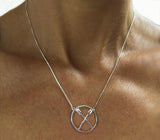 Necklace: lg. circle with rowing crossed oars on box chain by Rubini Jewelers