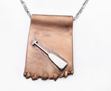 Dragon Boat Paddle on Copper Dragon's Claw Pendant, by Rubini Jewelers