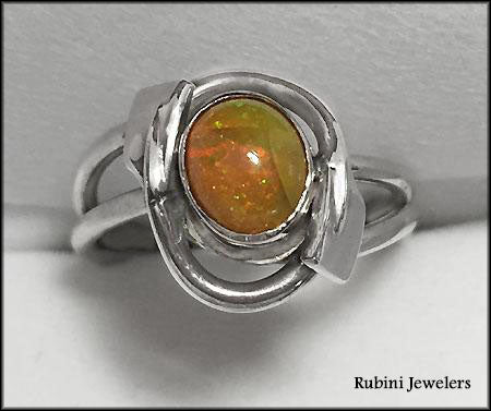 Ethiopian Opal in 14kt Bezel w/ Two Rowing Blades Ring by Rubini Jewelers