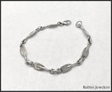 Bracelet: Heavy rowing tulip links by Rubini Jewelers