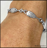 Bracelet: Heavy rowing tulip links by Rubini Jewelers