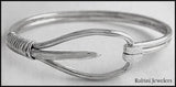 Bracelet: hooked open tulip rowing blade & wire wrapping by Rubini Jewelers