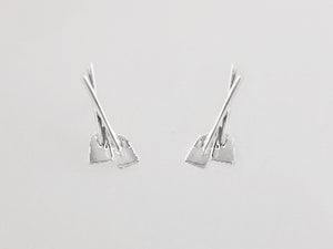 Overlapping Half-Oars Post Earrings, hatchets shown on ear, by Rubini Jewelers