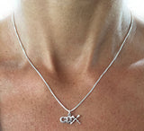 Small COX Pendant with Rowing Crossed Oars by Rubini Jewelers, shown on female rower's neck