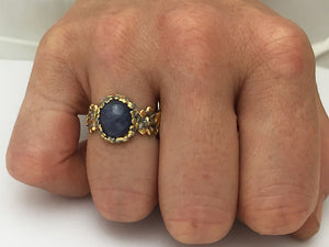 Sterling silver kyanite and peridot organic design ring at Rubini Jewelers