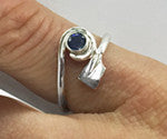 Sapphire in a Spiral with Hatchet Blade Rowing Ring by Rubini Jewelers