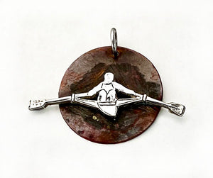 Silver Sculler on Oxidized Copper Disc Pendant by Rubini Jewelers