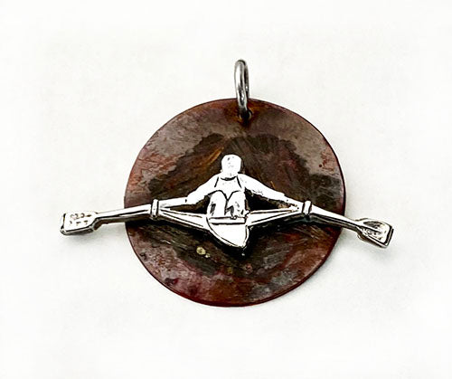 Silver Sculler on Oxidized Copper Disc Pendant by Rubini Jewelers