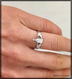 Sterling Silver Small Claddagh Rowing Ring by Rubini Jewelers shown on Rower's Hand