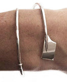 Small Rowing Oar Wrap Bracelet in Sterling Silver by Rubini Jewelers, shown on rower wrist