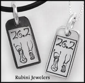 Tag Engraved with "Distance" and Running Feet Pendant by Rubini Jeweles