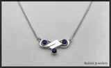 Trinity Sapphires and Small Rowing Hatchet Oar Necklace by Rubini Jewelers