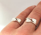 Sterling Silver Two Overlapping Oars Rowing Ring by Rubini Jewelers Shown on Rowers Hand