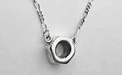 Necklace: Sterling 7/16'' nut on figaro chain